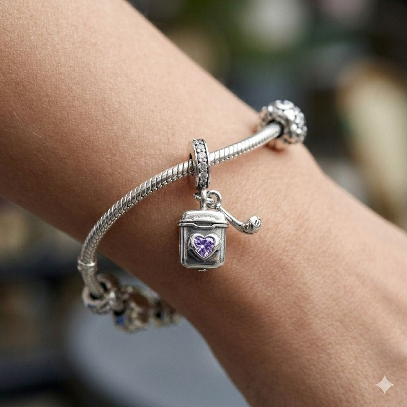 CHARM EN FORMA DE AUDIFONOS PANDORA DE PLATA 9.25 PESO: 1.9G