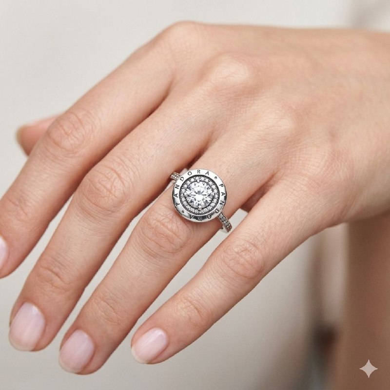 ANILLO PANDORA DE PLATA 9.25 CON DIAMANTE CIRCULAR PESO: 3.9G