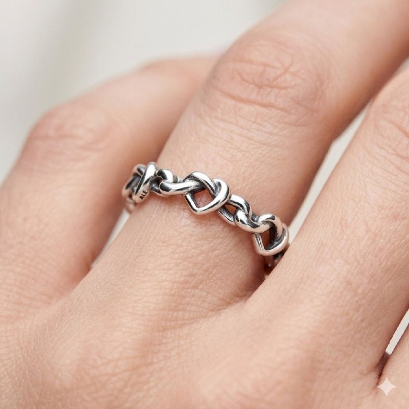 ANILLO PANDORA DE PLATA 9.25 DE CORAZONES ENTRELAZADOS PESO: 1.4G