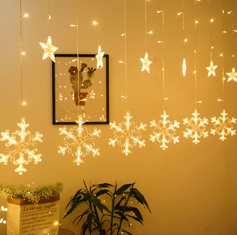 LUCES DECORATIVAS NAVIDEÑAS CORTINA DE LUCES LED FORMA DE ESTRELLA Y COPOS DE NIEVE 8 MODOS DE LUZ 20X9.5X20CM
