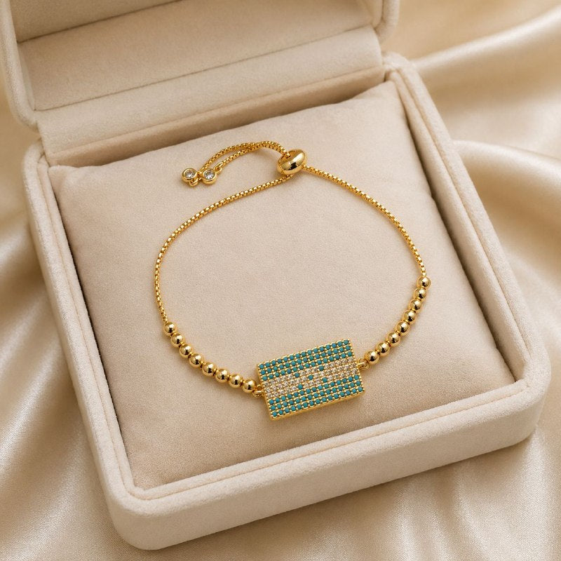 PULSERA DE ENCHAPE ELASTICA PARA DAMA CON DISEÑO  DE HONDURAS