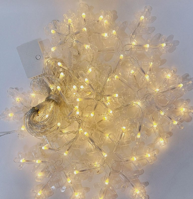 LUCES DECORATIVAS NAVIDEÑAS CORTINA DE LUZ LED AMARILLA CON DISEÑO DE COPO DE NIEVE 18.5X11X18.5CM