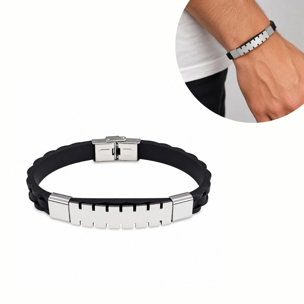 PULSERA PARA CABALLERO DE SILICONA NEGRA CON PLACA ENCHAPADA Y DETALLES DENTADOS