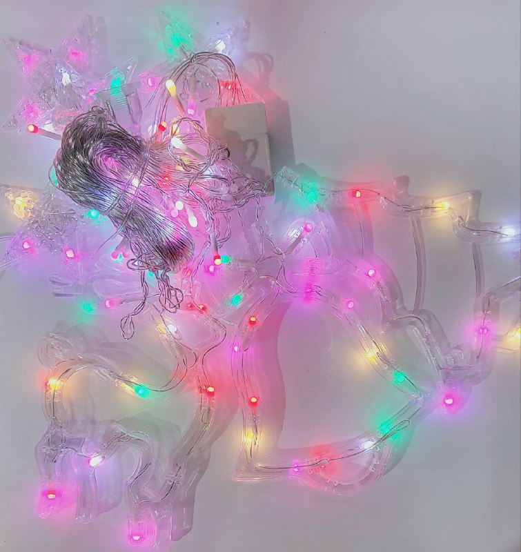 LUCES DECORATIVAS NAVIDEÑAS CORTINA DE LUZ LED MULTICOLOR DE 107 LUCES DE DISEÑOS ESTRELLA, RENO, ARBOL Y CAMPANA IDEAL PARA EL HOGAR PATIO O HABITACION 18.5X11X18.5CM