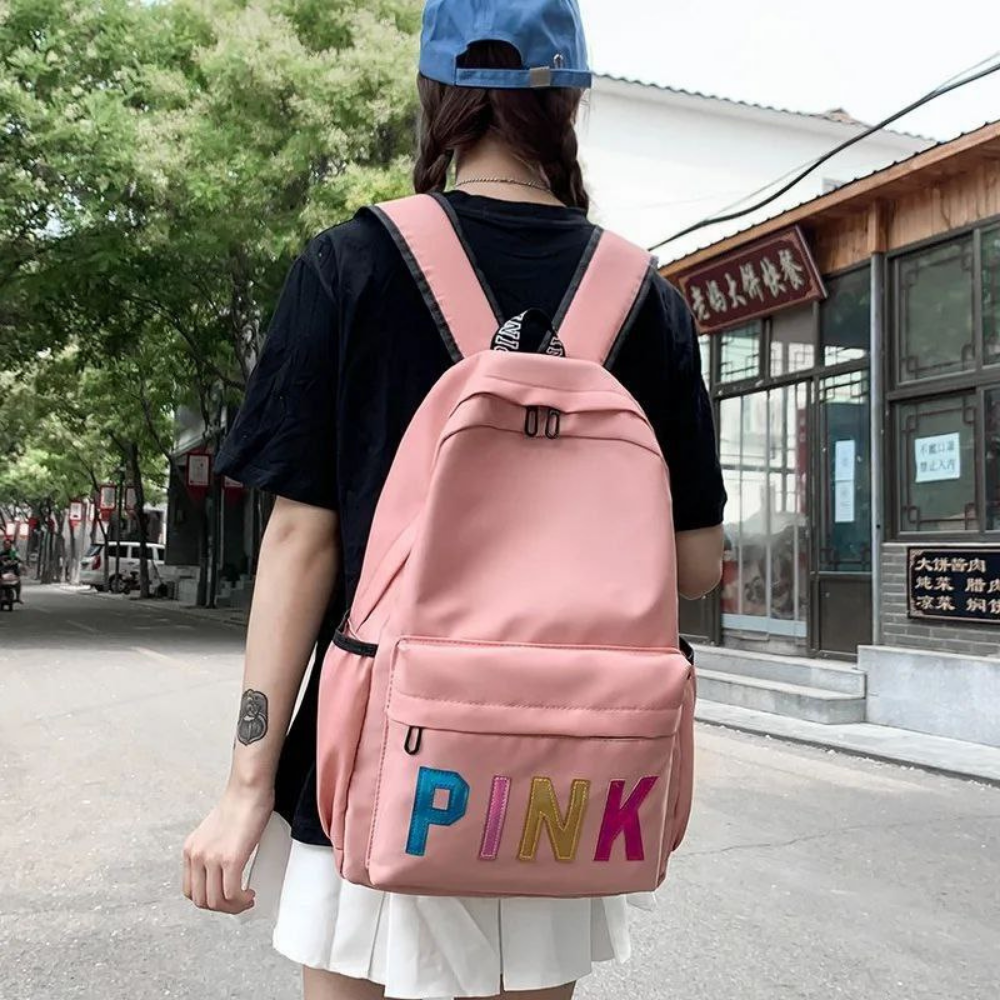 MOCHILA ECONÓMICA PINK DE TELA IMPERMEABLE COLOR ROSADO