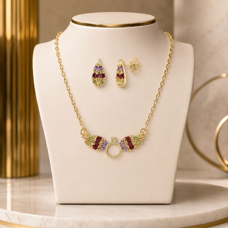 SET DE ENCHAPE PARA DAMA COLLAR Y TOPOS ALAS DUALES CON CIRCONES BAGUETTE MULTICOLOR