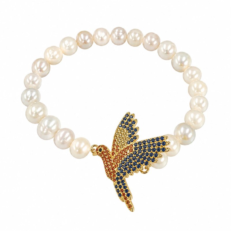 PULSERA DE ENCHAPE ELASTICA PARA DAMA CON DISEÑO DE PAJARO