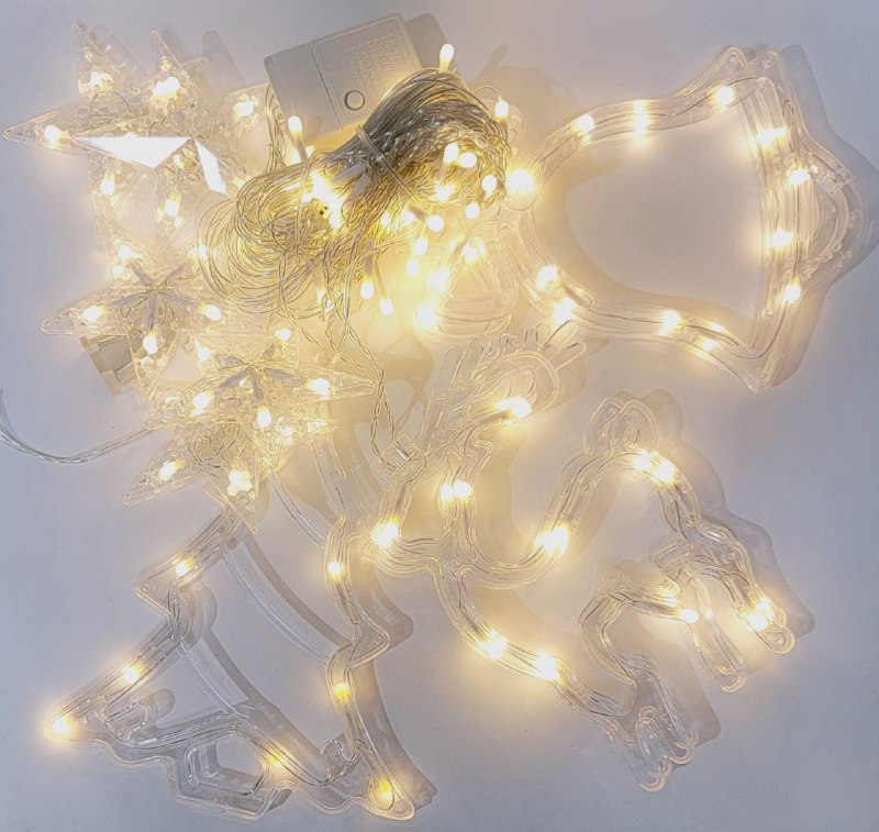 LUCES DECORATIVAS NAVIDEÑAS CORTINA DE LUZ LED DE 107 LUCES CAIDAS EN FORMA DE ESTRELLA, RENO, ARBOL Y CAMPANA, CON CAMBIOS DE LUZ AMARILLA ACOGEDORA 18.5X11X18.5CM