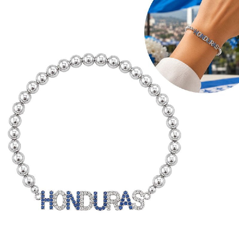 PULSERA DE ENCHAPE ELASTICA PARA DAMA CON DISEÑO DE HONDURAS