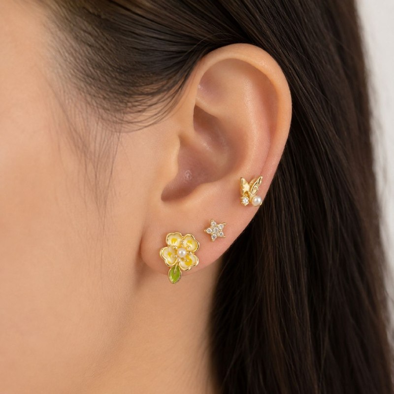 SET DE 3 PARES DE ARITOS DE ENCHAPE PARA DAMA CON DISEÑO DE FLOR, MARIPOSA Y ESTRELLA